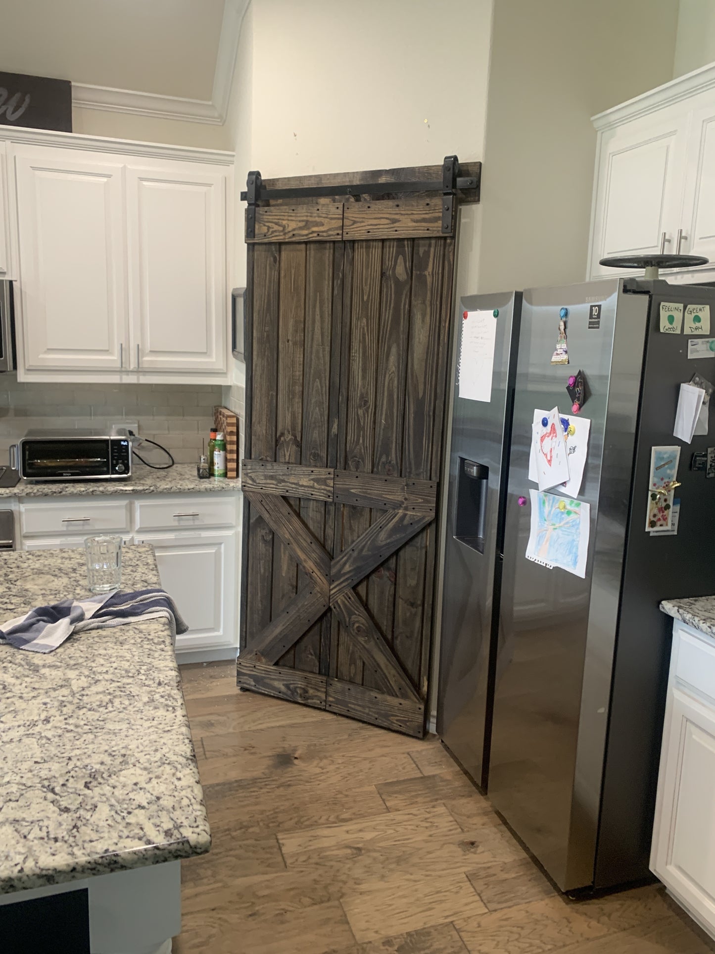 Rustic X-Brace Sliding Barn Door with Black Hardware