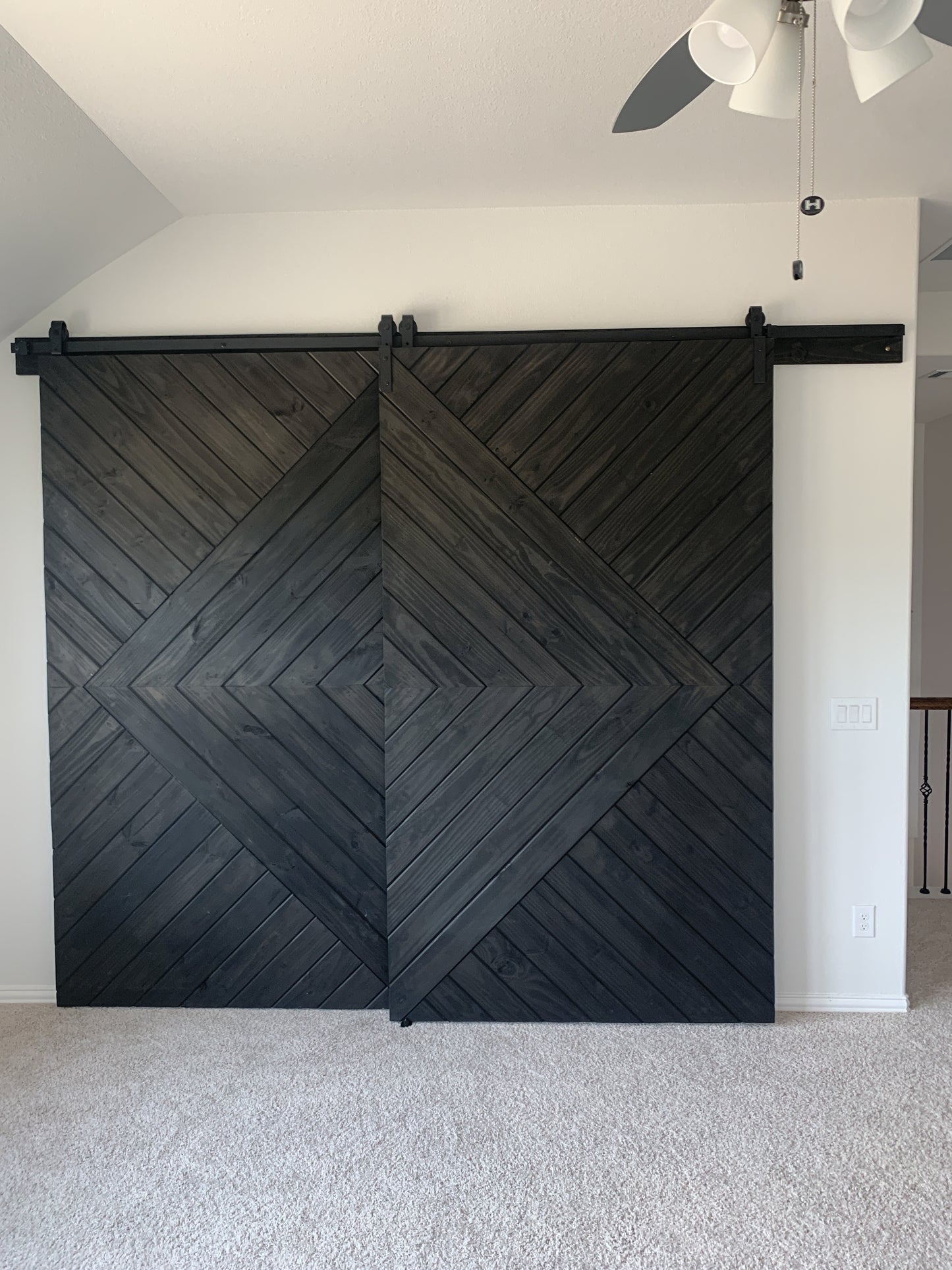Chevron Pattern Sliding Barn Door with Black Finish
