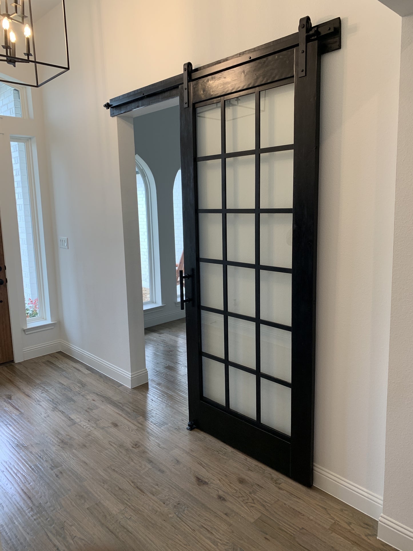 Classic Grid Black Barn Door with Glass Panels