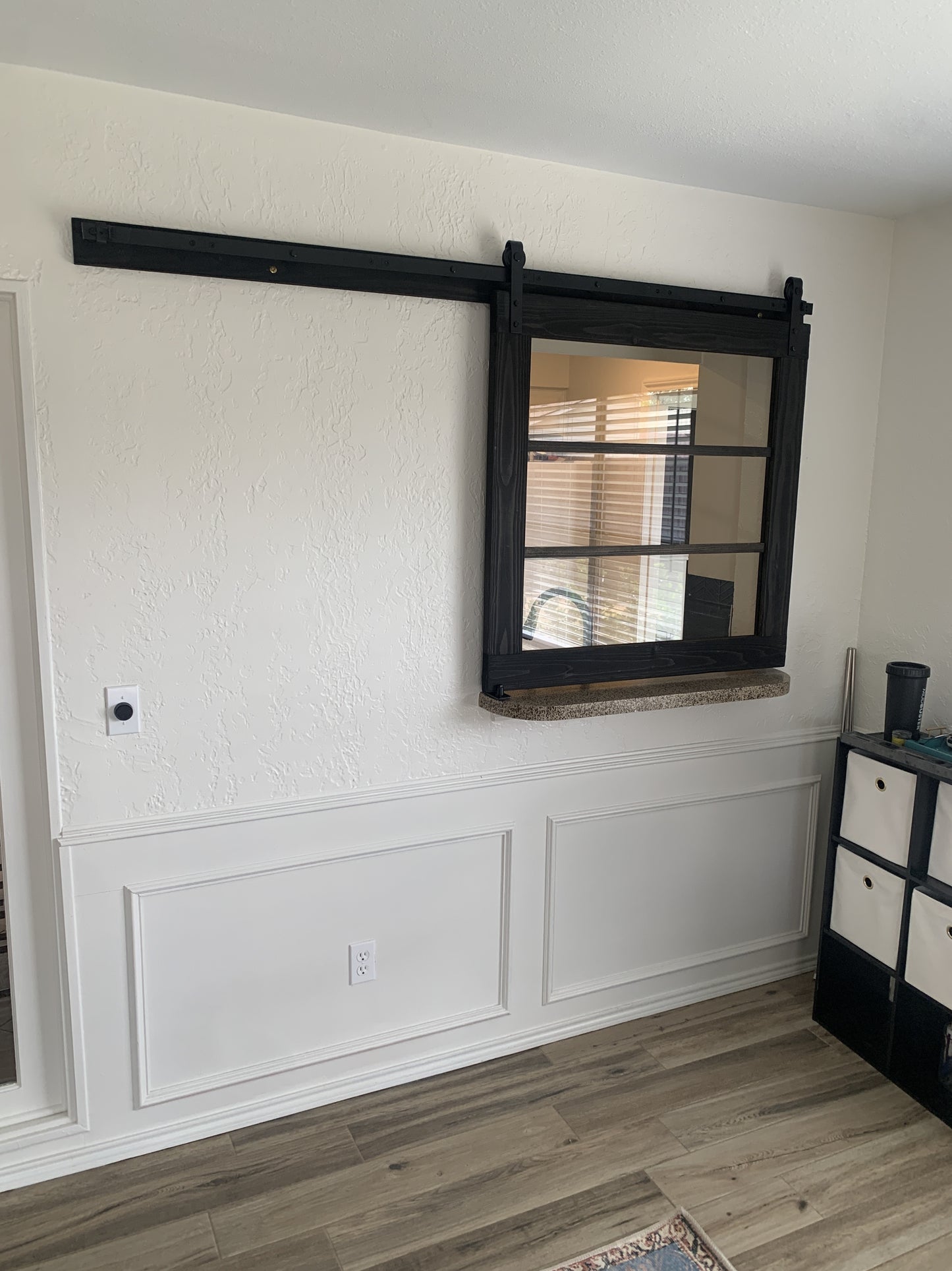 Barn Door with Horizontal Panels and Black Hardware