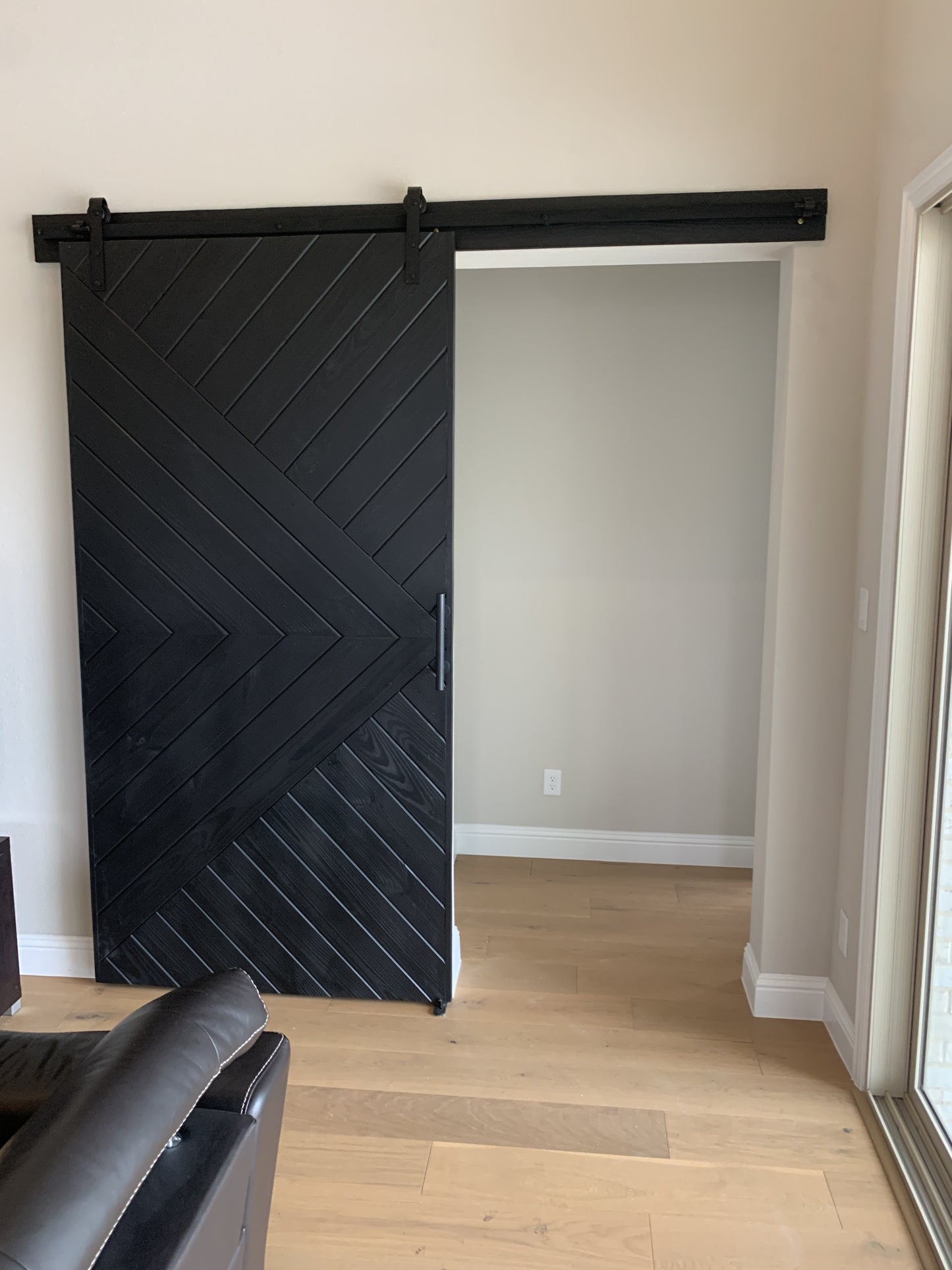 Chevron Panel Barn Door with Black Finish