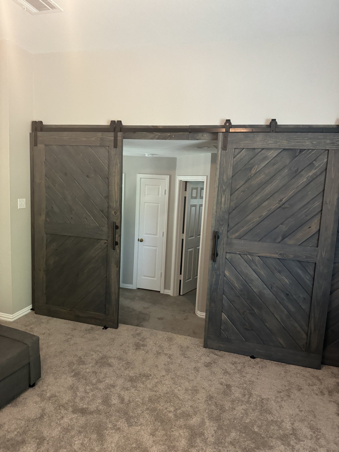 Chevron-Style Double Barn Door with Rustic Finish