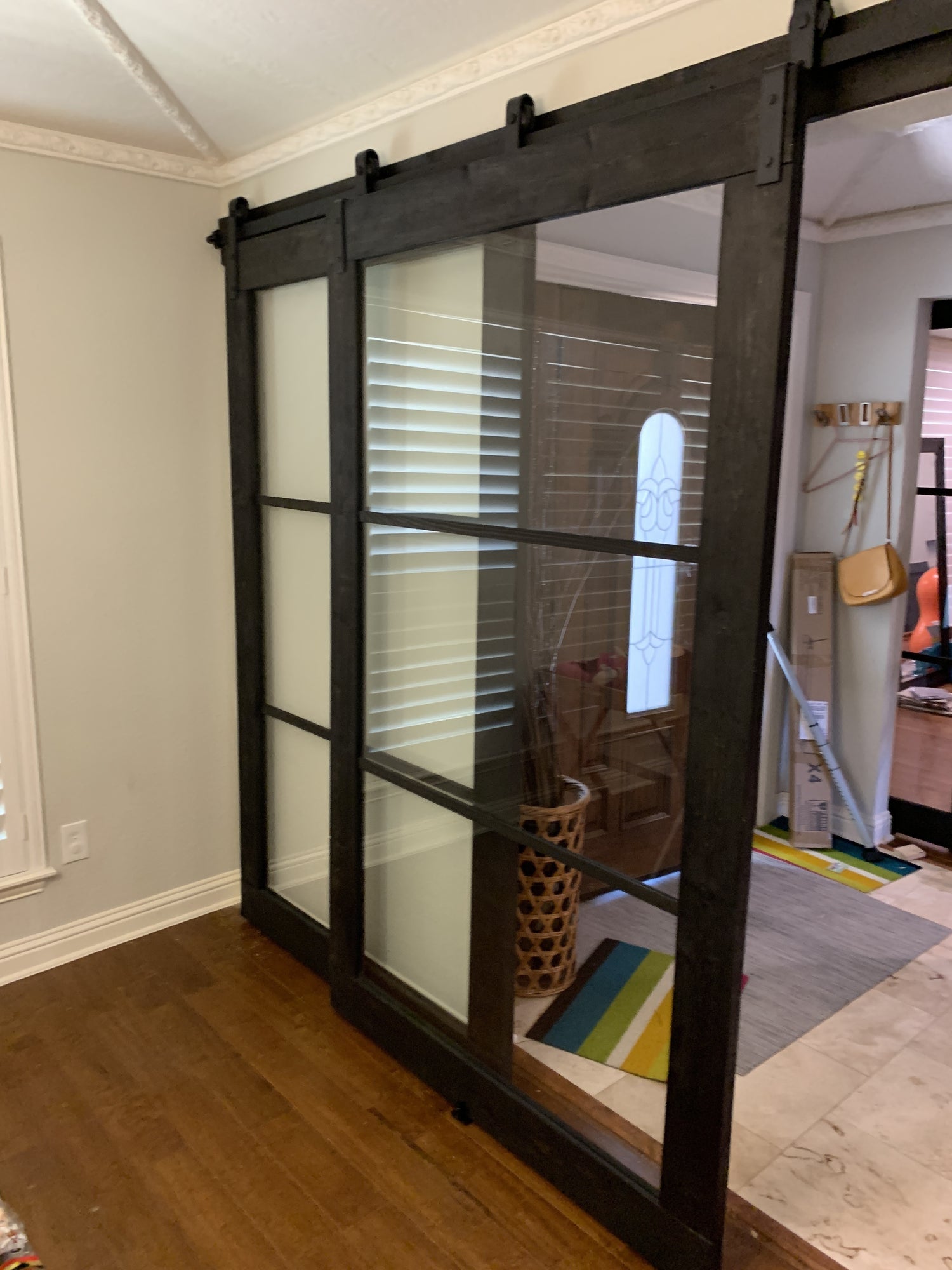 Sliding Barn Door with Glass Panels and Black Hardware