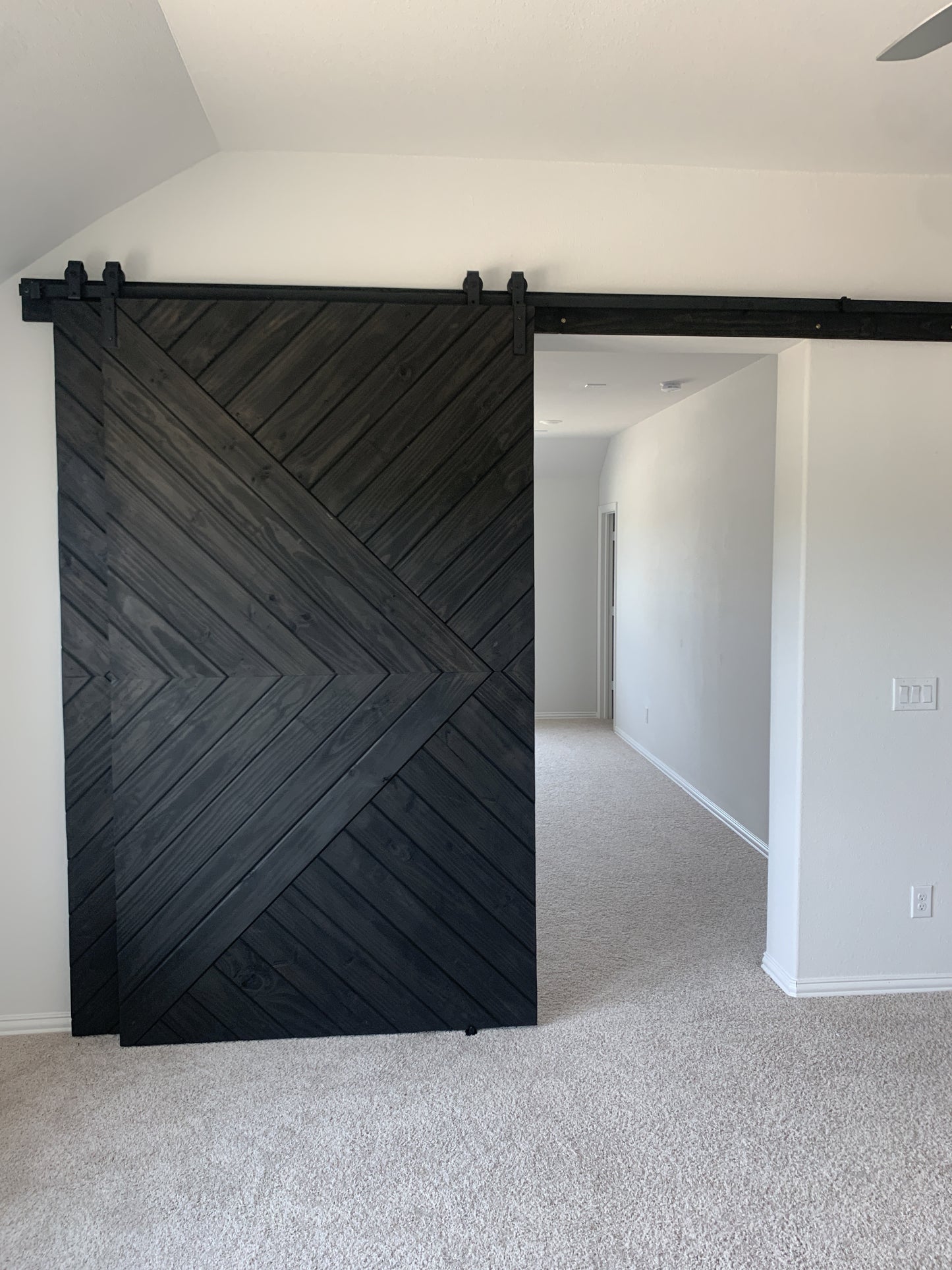 Chevron Pattern Barn Door with Black Finish