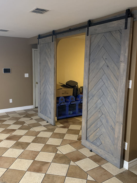 Chevron Pattern Sliding Barn Door with Black Hardware