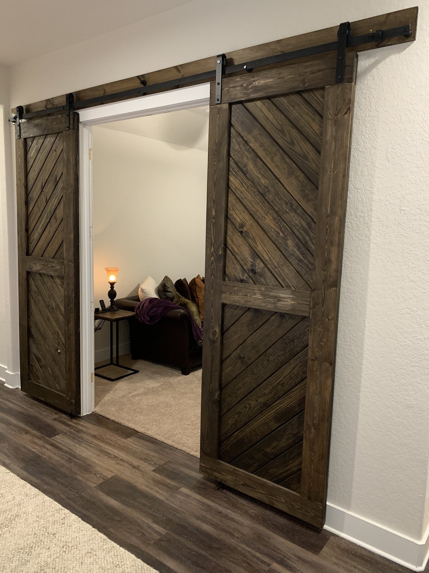 Chevron Pattern Sliding Barn Door with Dark Finish