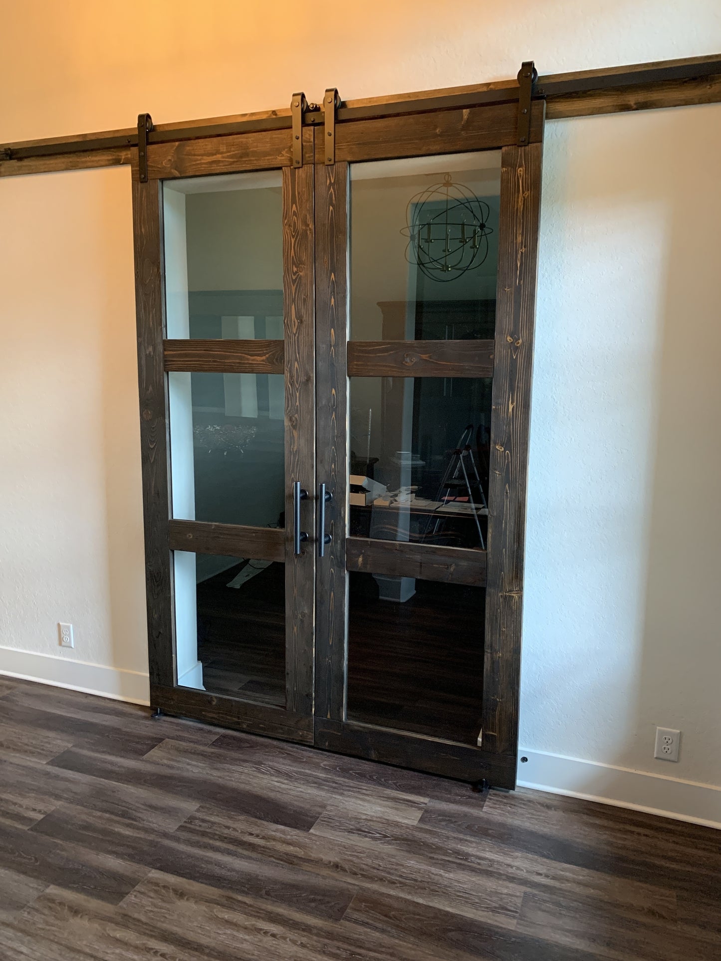 Elegant Vertical Slat Barn Door with Glass Inserts