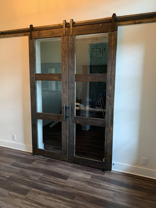 Elegant Vertical Slat Barn Door with Glass Inserts