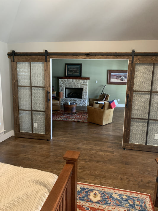 Rustic Barn Door with Glass Panels and Dark Wood Finish