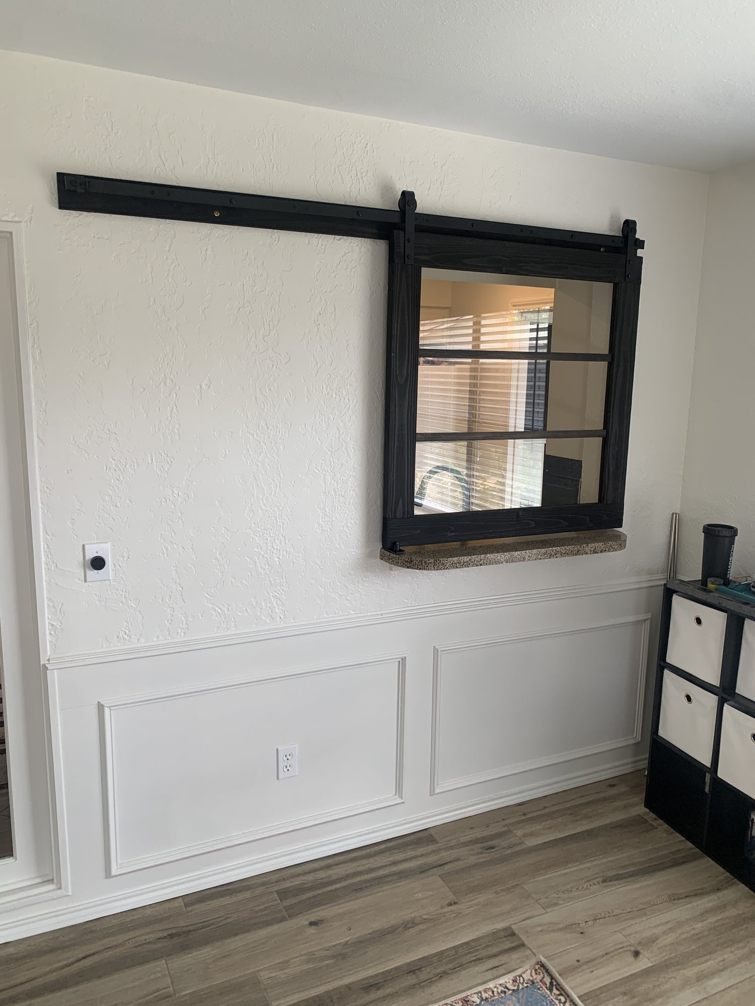 Barn Door with Horizontal Panels and Black Hardware