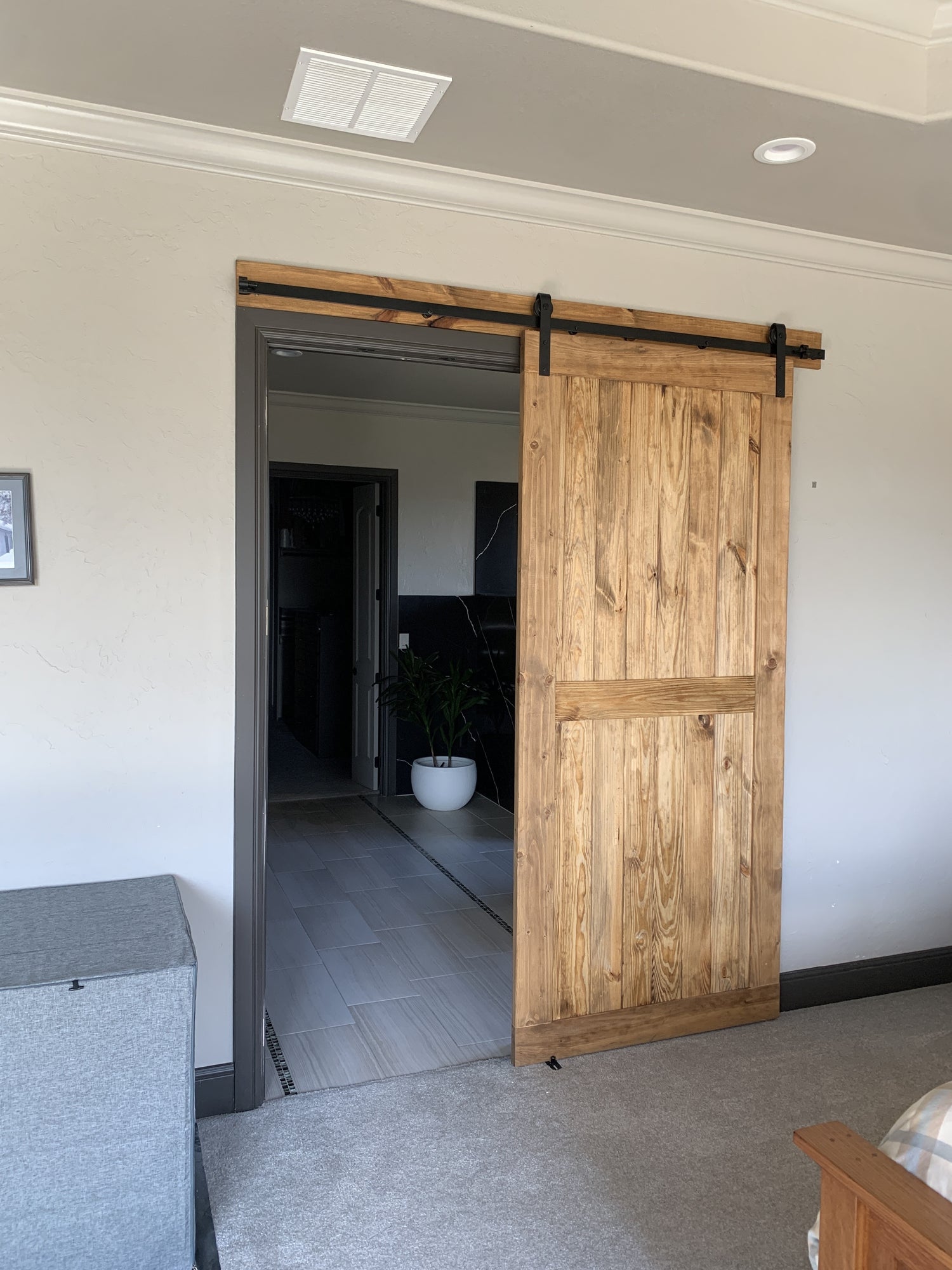 Rustic Flat Board Barn Door with Dark Metal Hardware