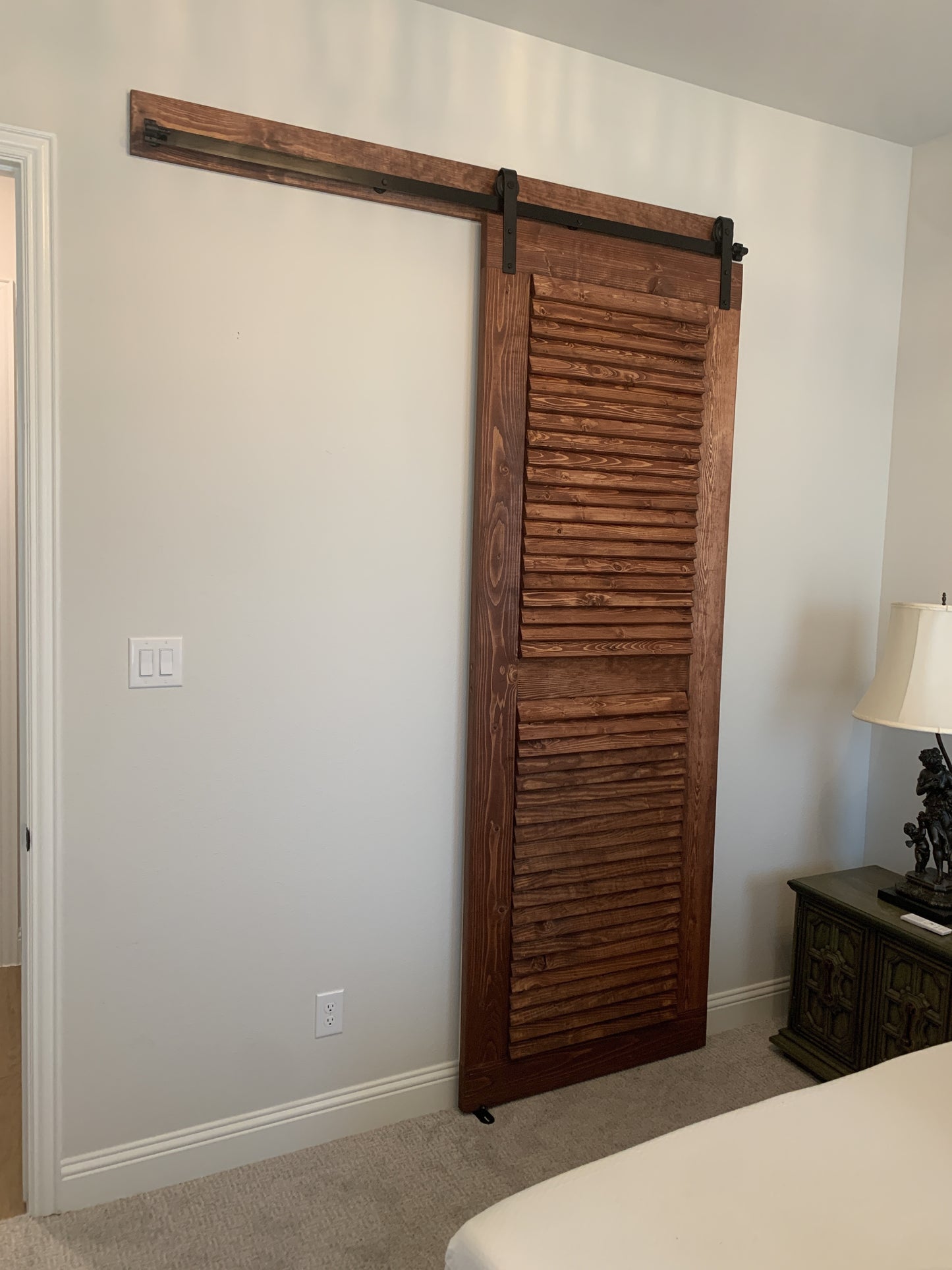 Horizontal Slat Barn Door with Dark Wood Finish