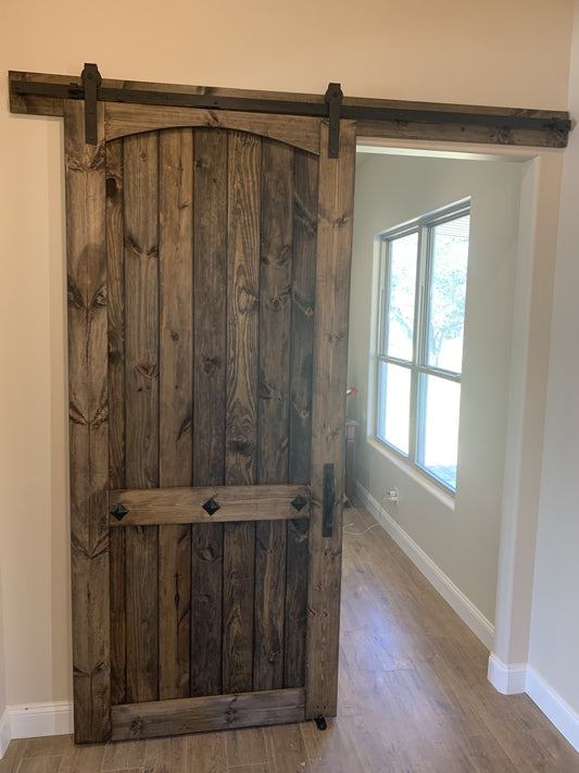 Arched Panel Barn Door with Rustic Finish
