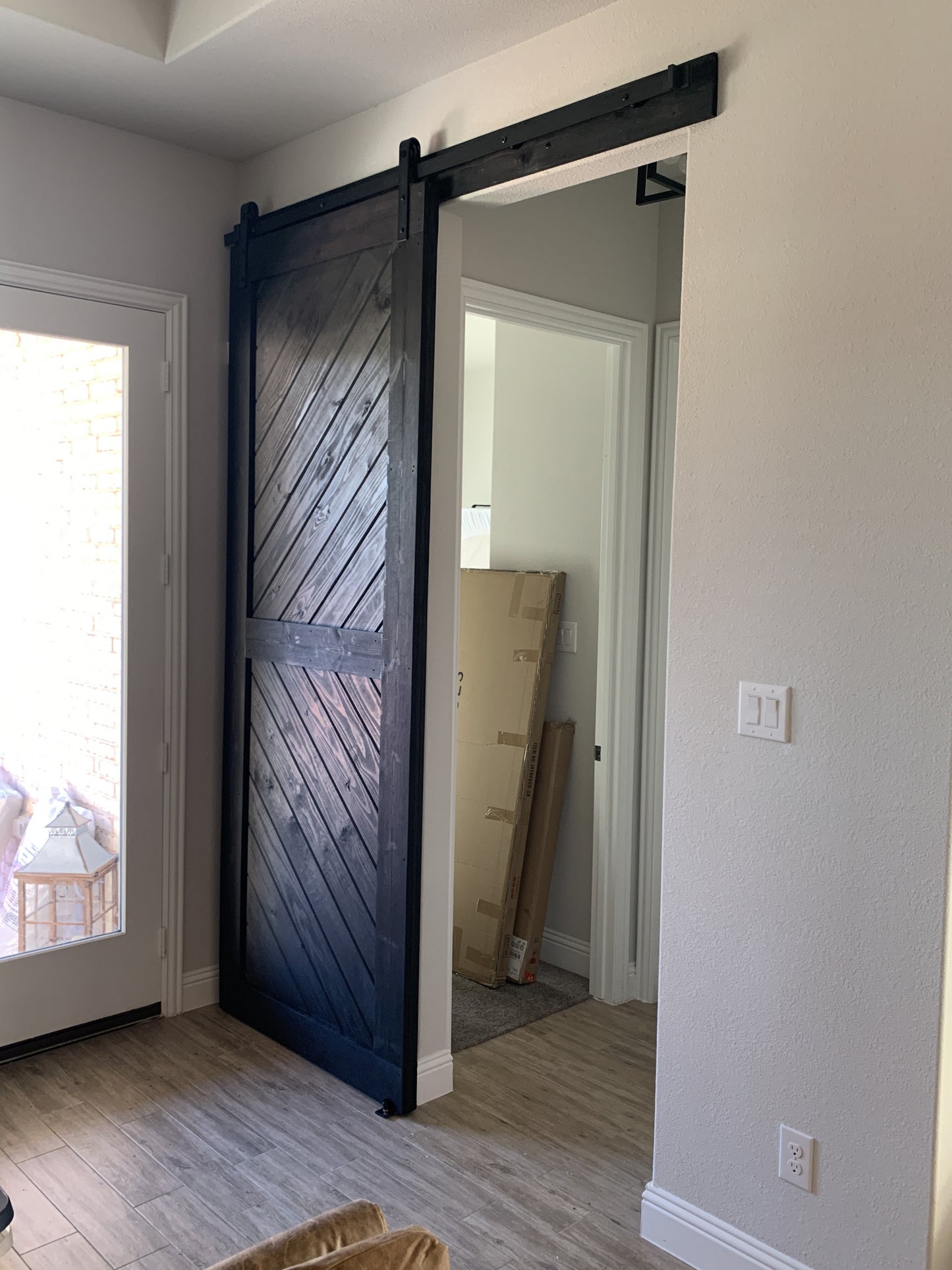 Chevron Pattern Barn Door with Black Finish