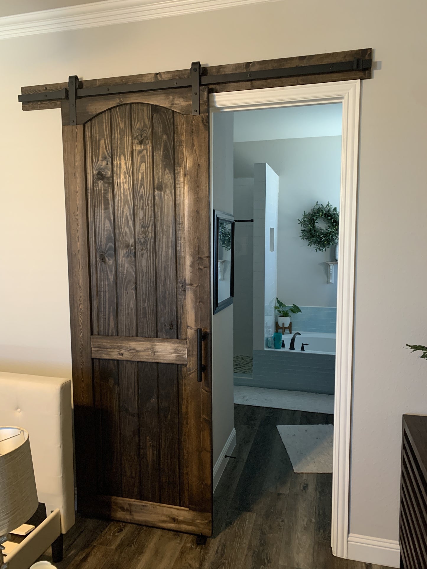 Rustic Barn Door with Arched Top and Dark Wood Finish