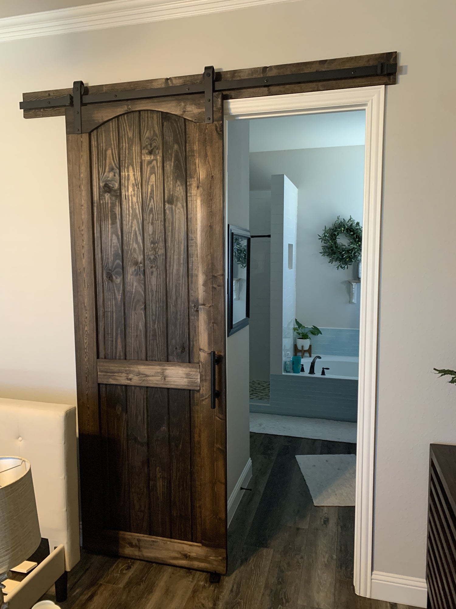 Rustic Barn Door with Arched Top and Dark Wood Finish