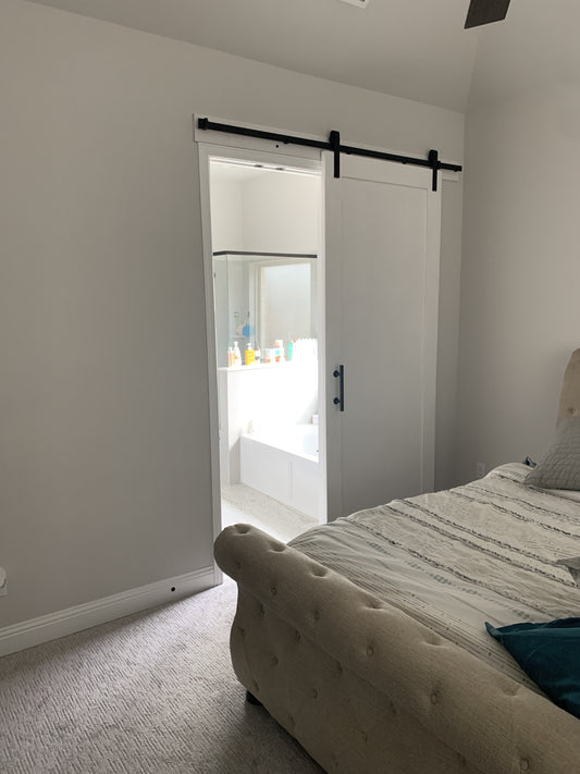 Minimalist White Barn Door with Black Hardware