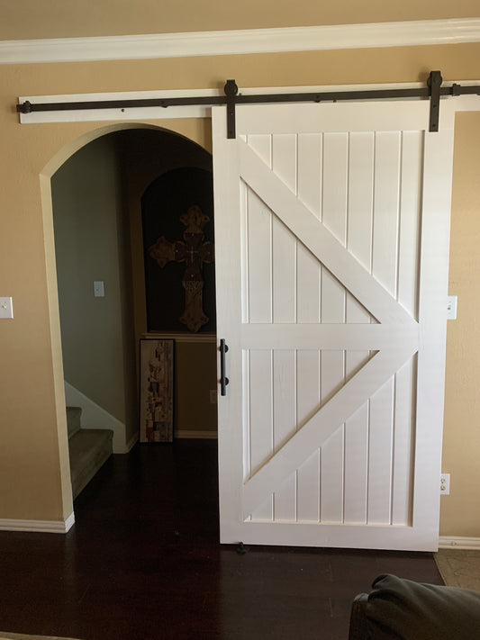 White Sliding Barn Door with X-Brace Design