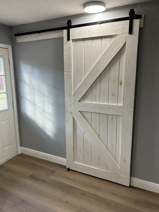 Rustic X-Brace Barn Door with Distressed Finish