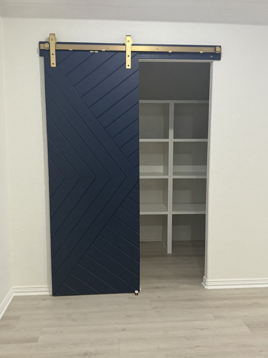 Chevron Design Barn Door with Gold Hardware