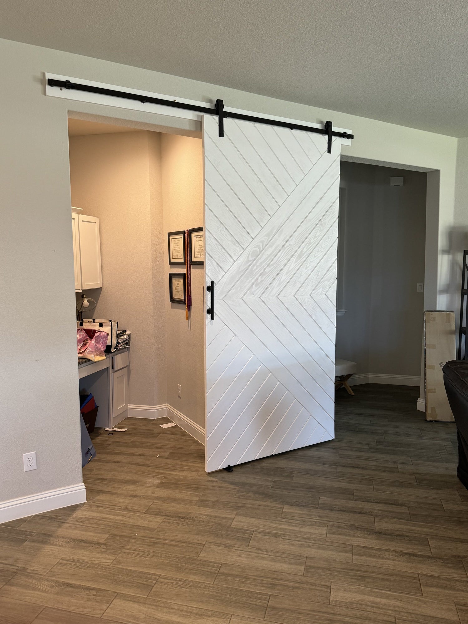 Chevron Pattern Sliding Barn Door with Black Hardware