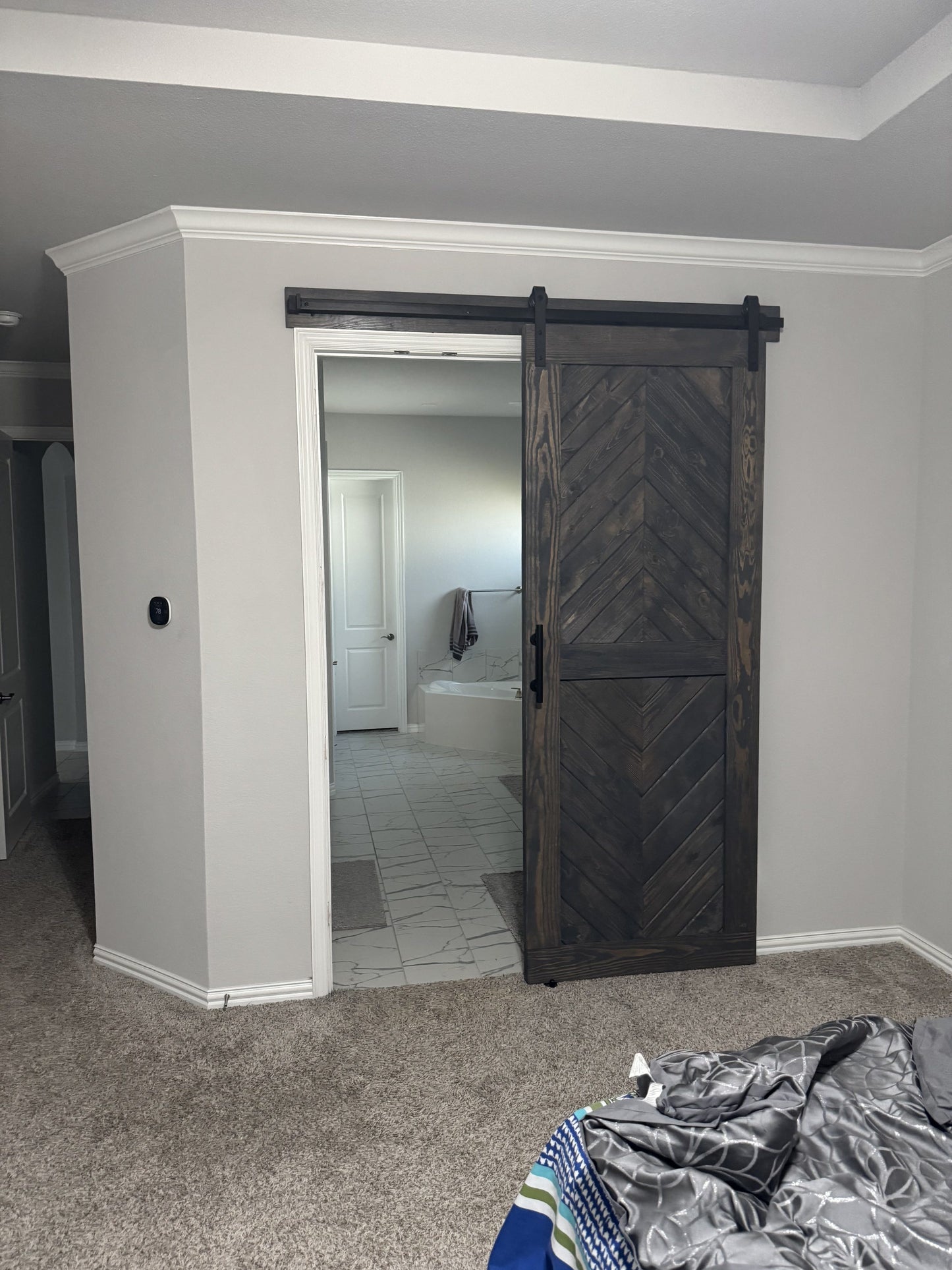 Chevron Pattern Barn Door with Dark Wood Finish