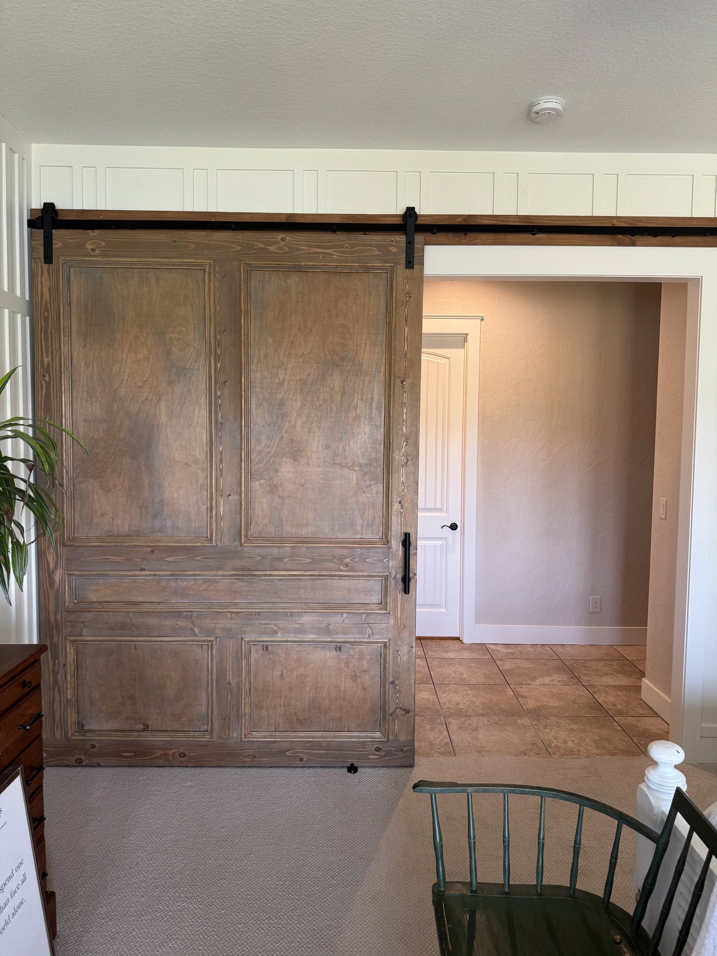 Flat Panel Barn Door with Dark Hardware
