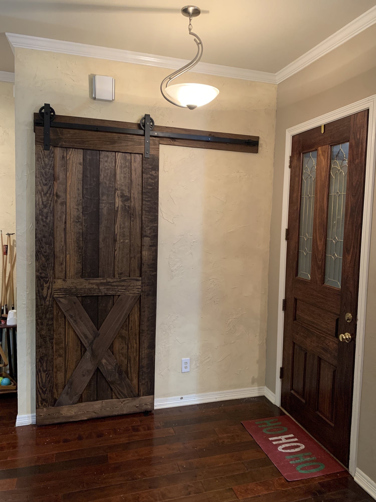 Rustic X-Brace Barn Door with Dark Finish