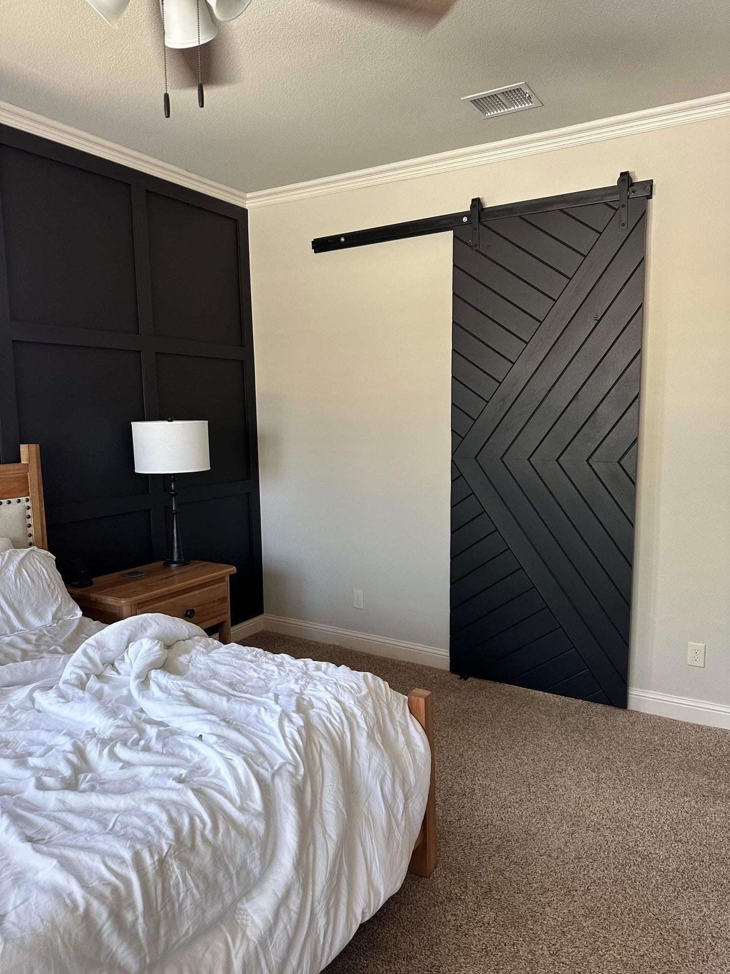 Chevron Pattern Sliding Barn Door with Black Hardware