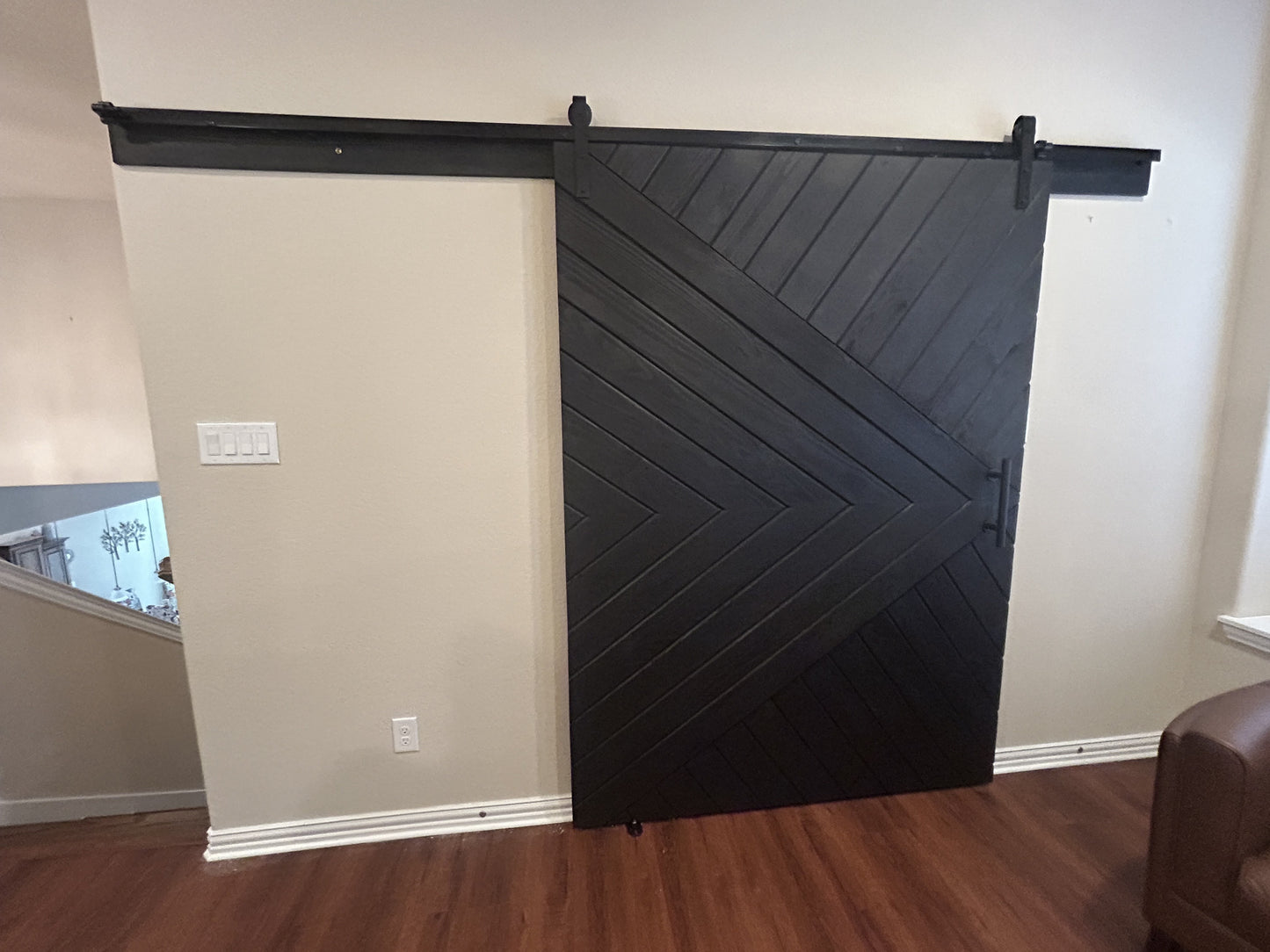 Chevron Pattern Barn Door with Black Finish