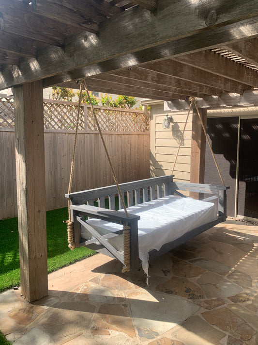 Twin size cedar porch swing bed with natural cedar finish and clear coat