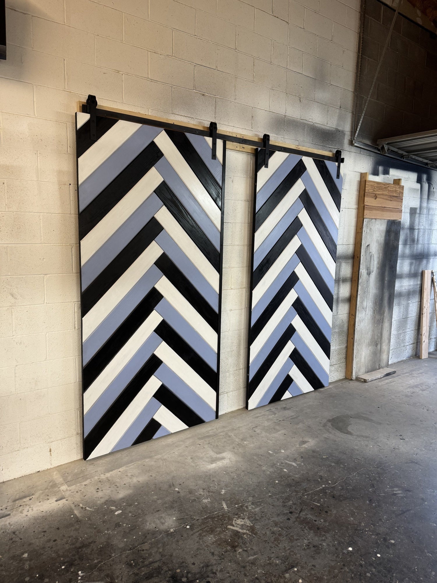 Chevron Pattern Barn Door with Black Hardware