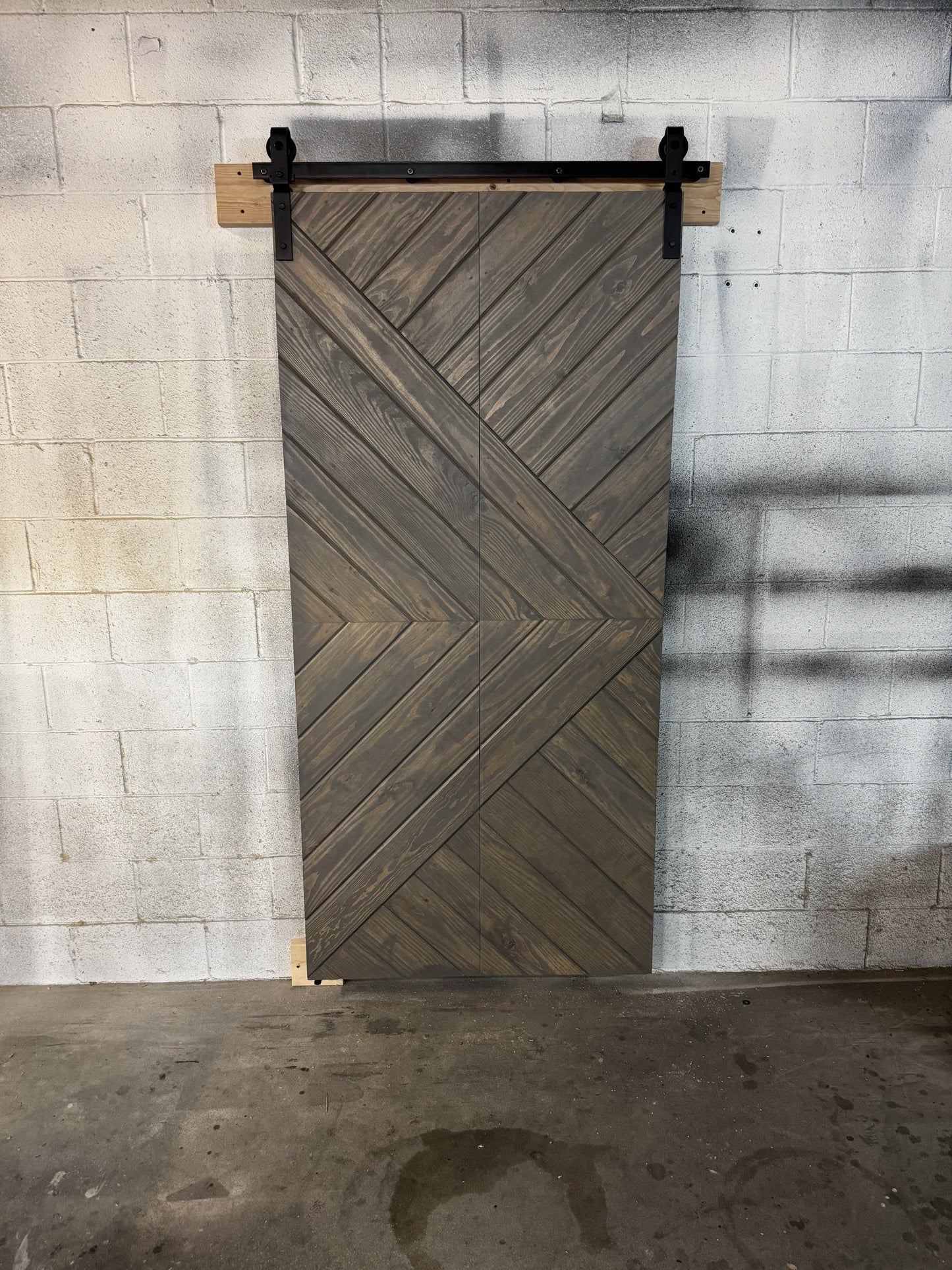 Chevron Pattern Barn Door with Industrial Hardware