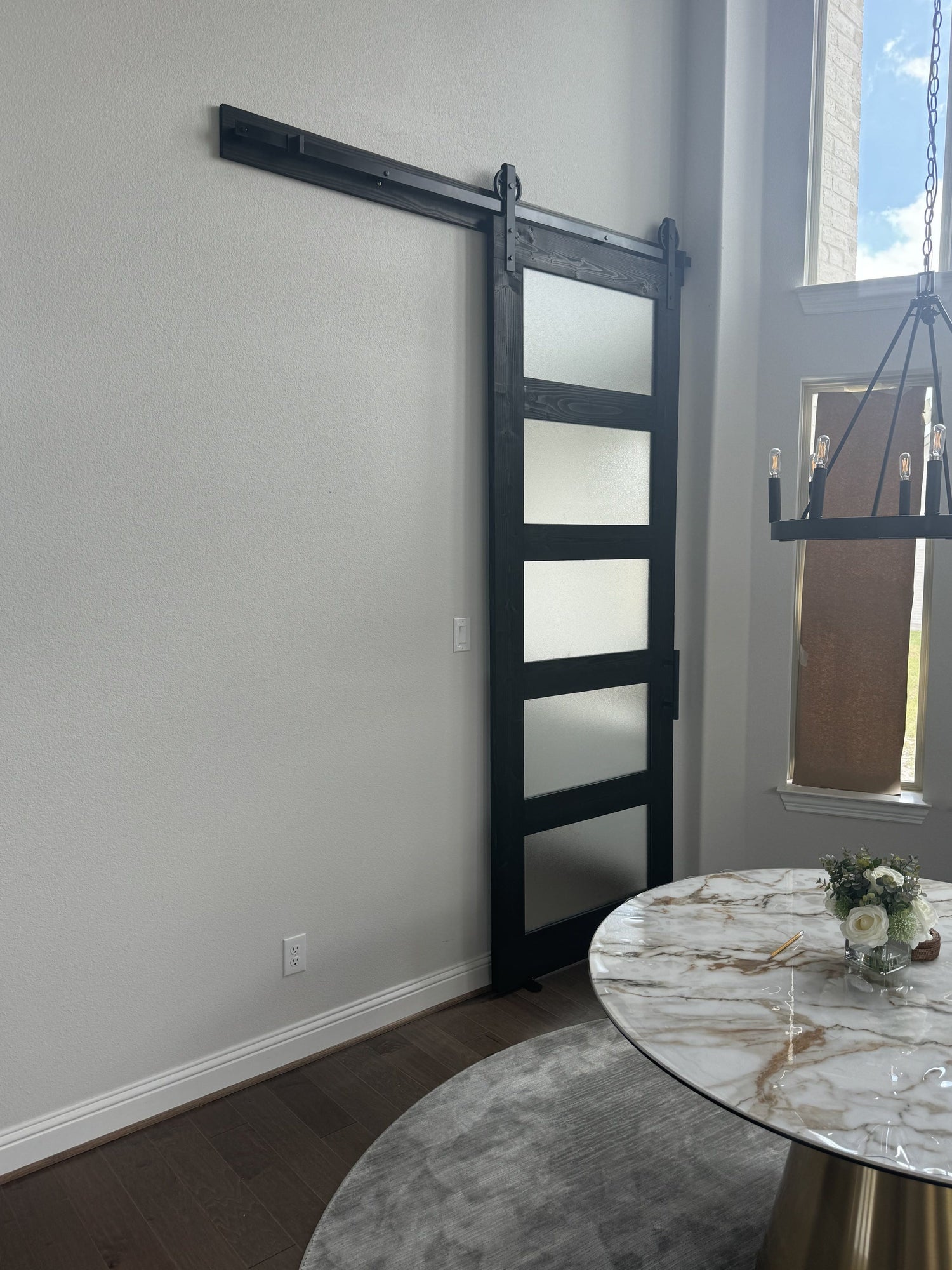 Modern Frosted Glass Barn Door with Black Frame