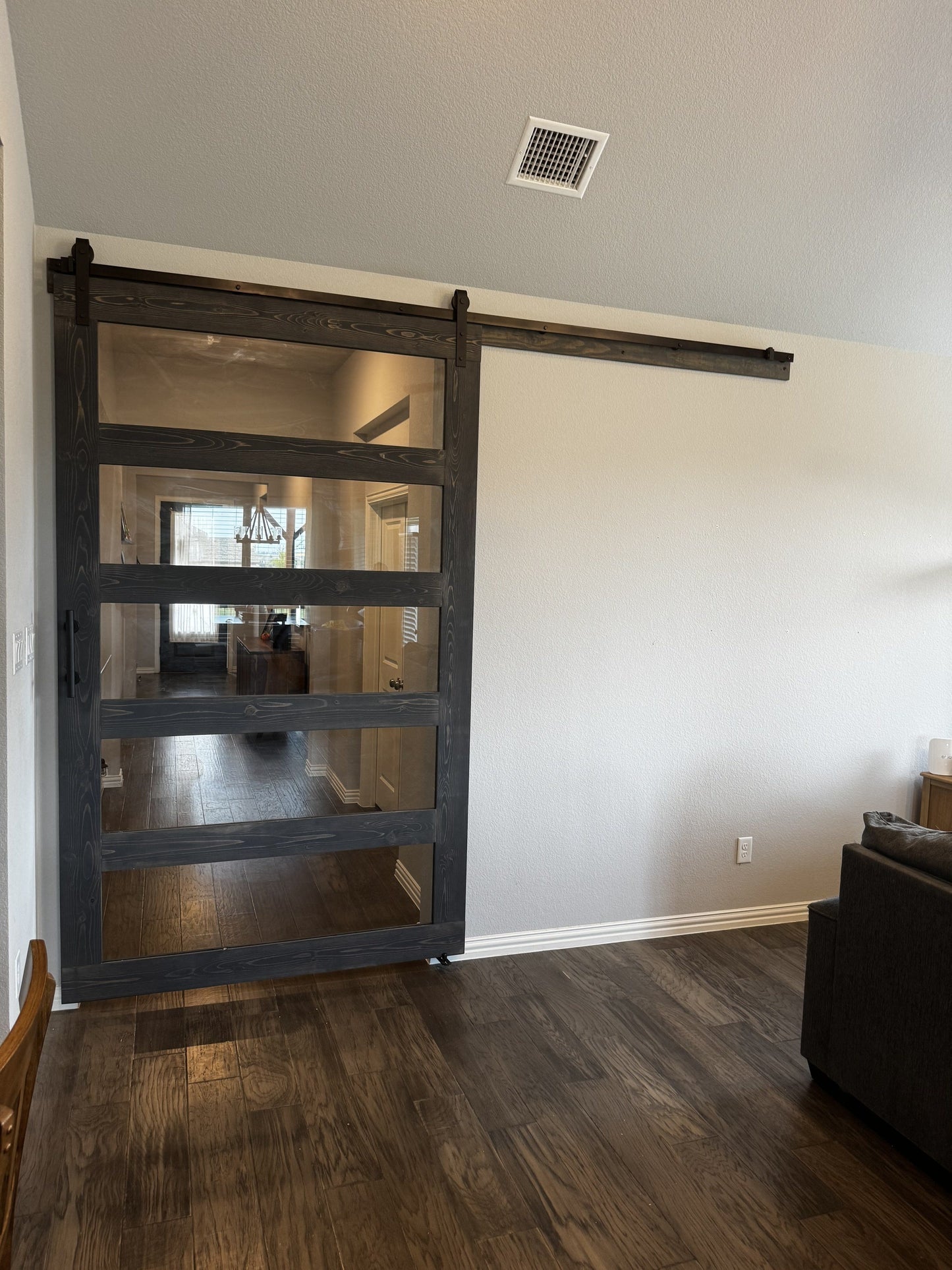 Modern Vertical Slat Barn Door with Glass Panels