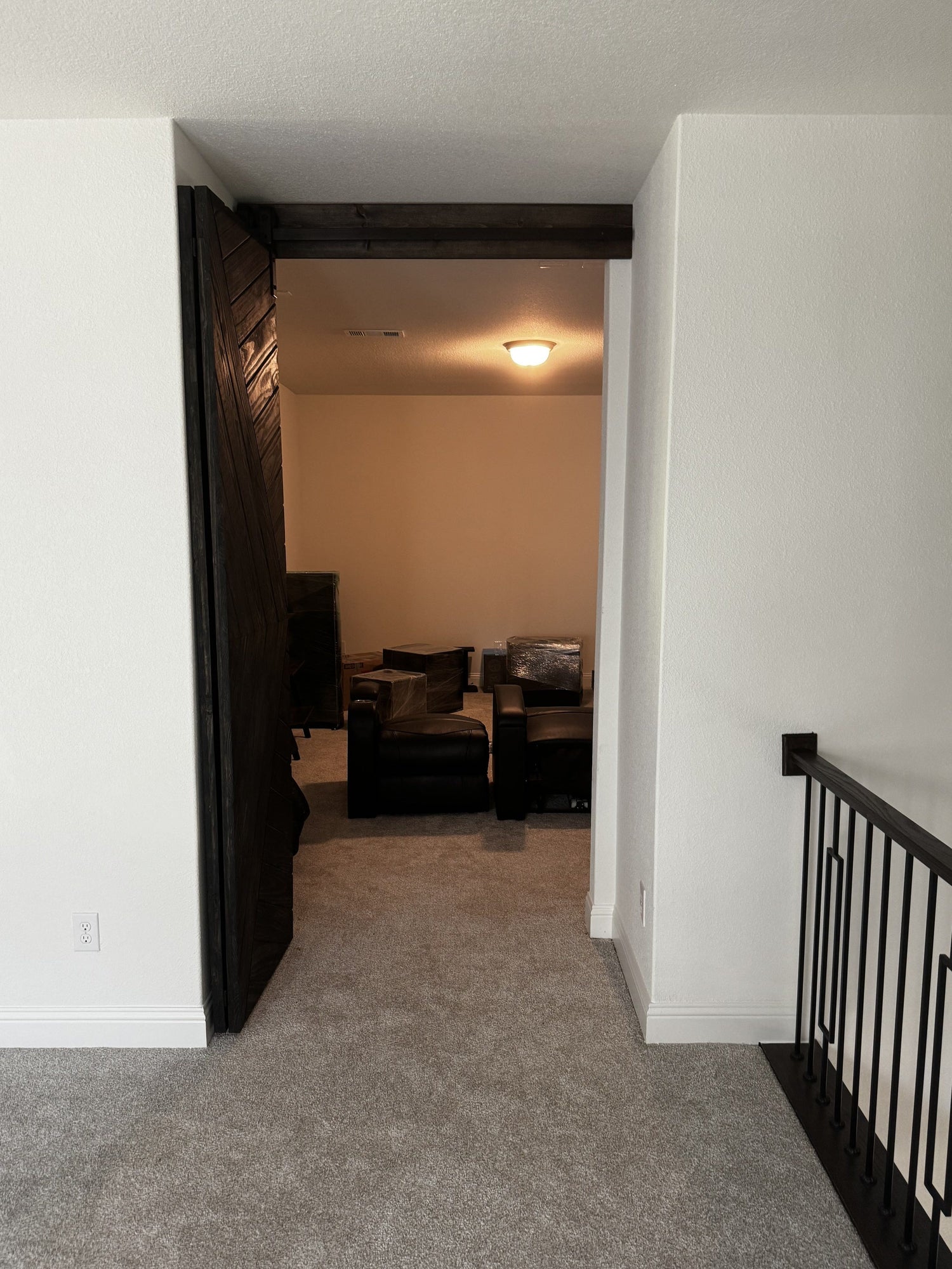X-brace Dark Wood Barn Door with Wrought Iron Rail